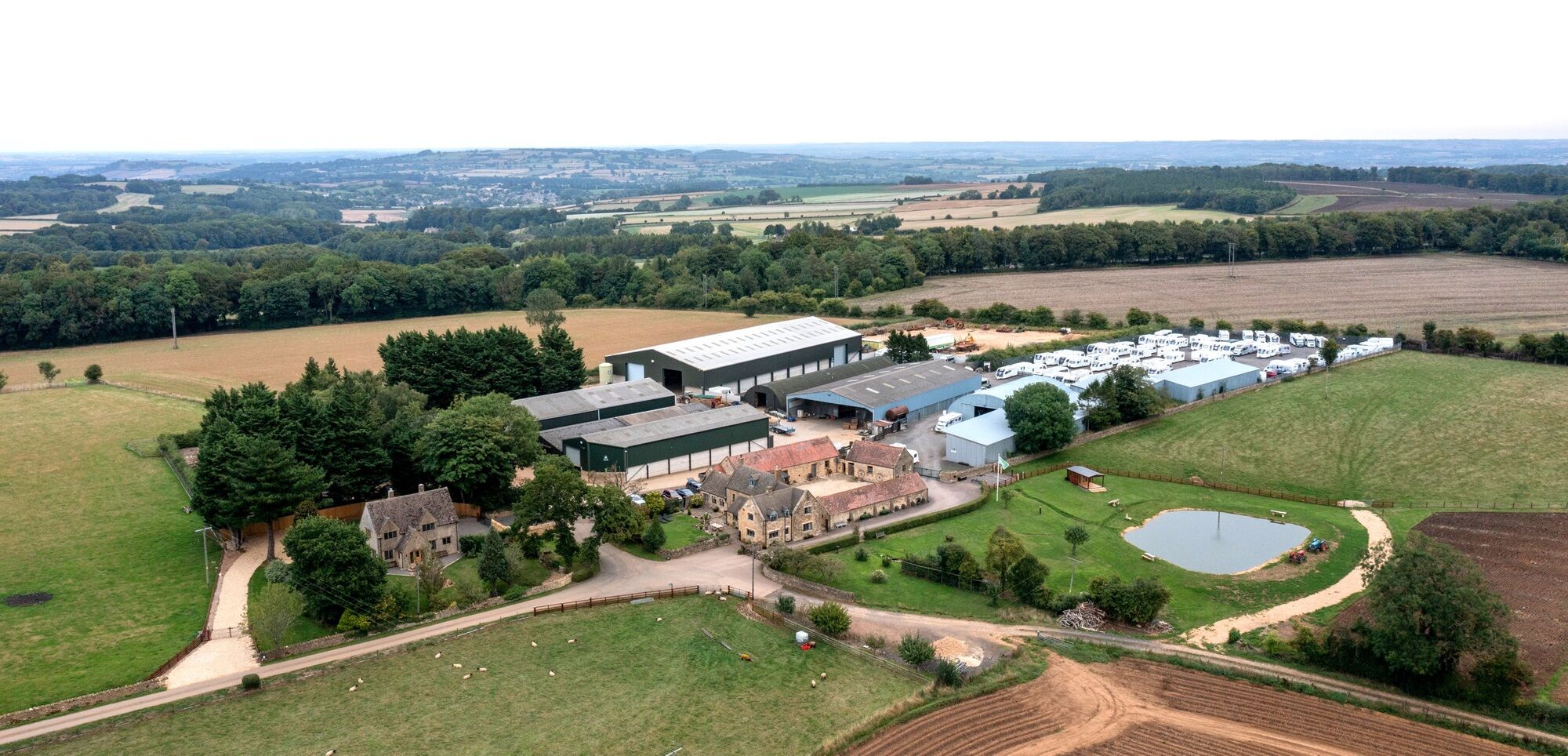 Aerial view of Tower Storage with Cotswold landscape in the background