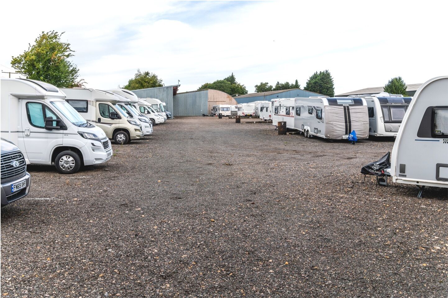 Caravans and motorhomes parked in storage